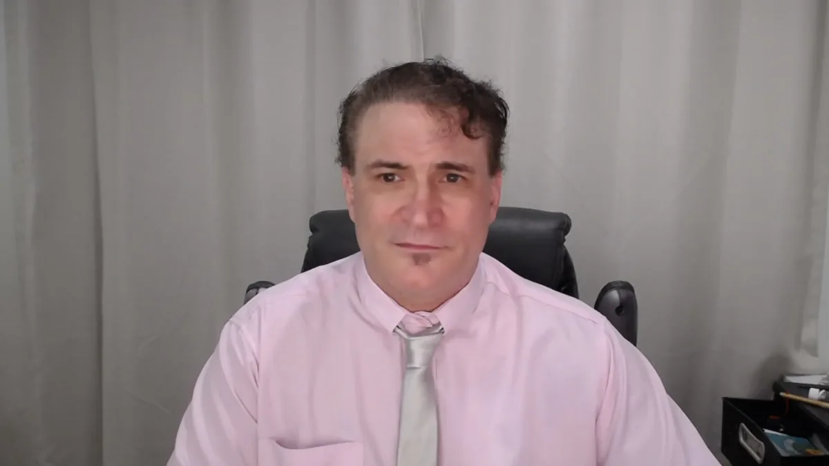 A real webcam picture: the teacher in his own room, no effects